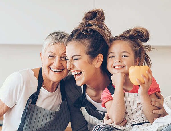 Three generations of women laughing